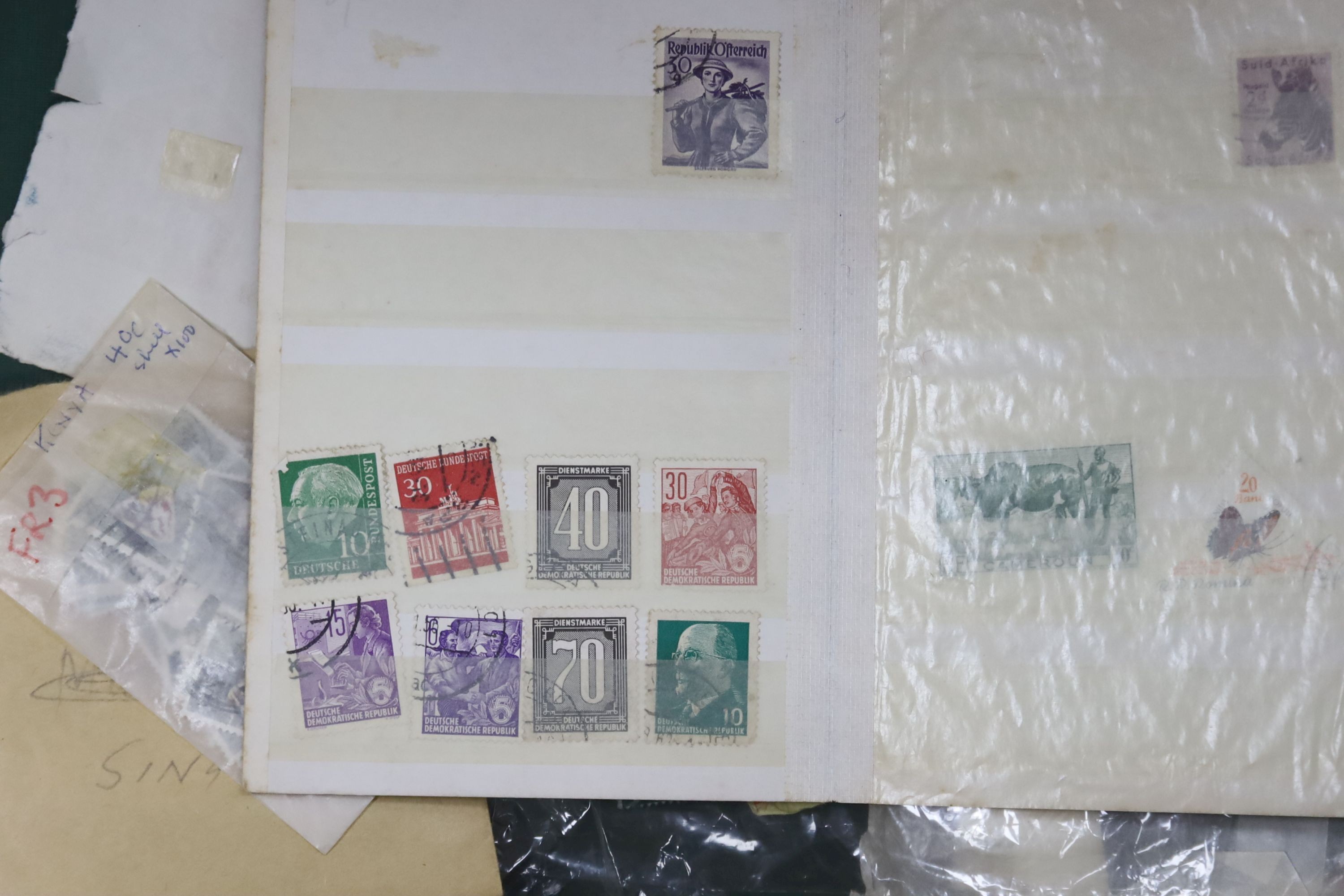 Various world stamps and first day covers, in albums and loose.
